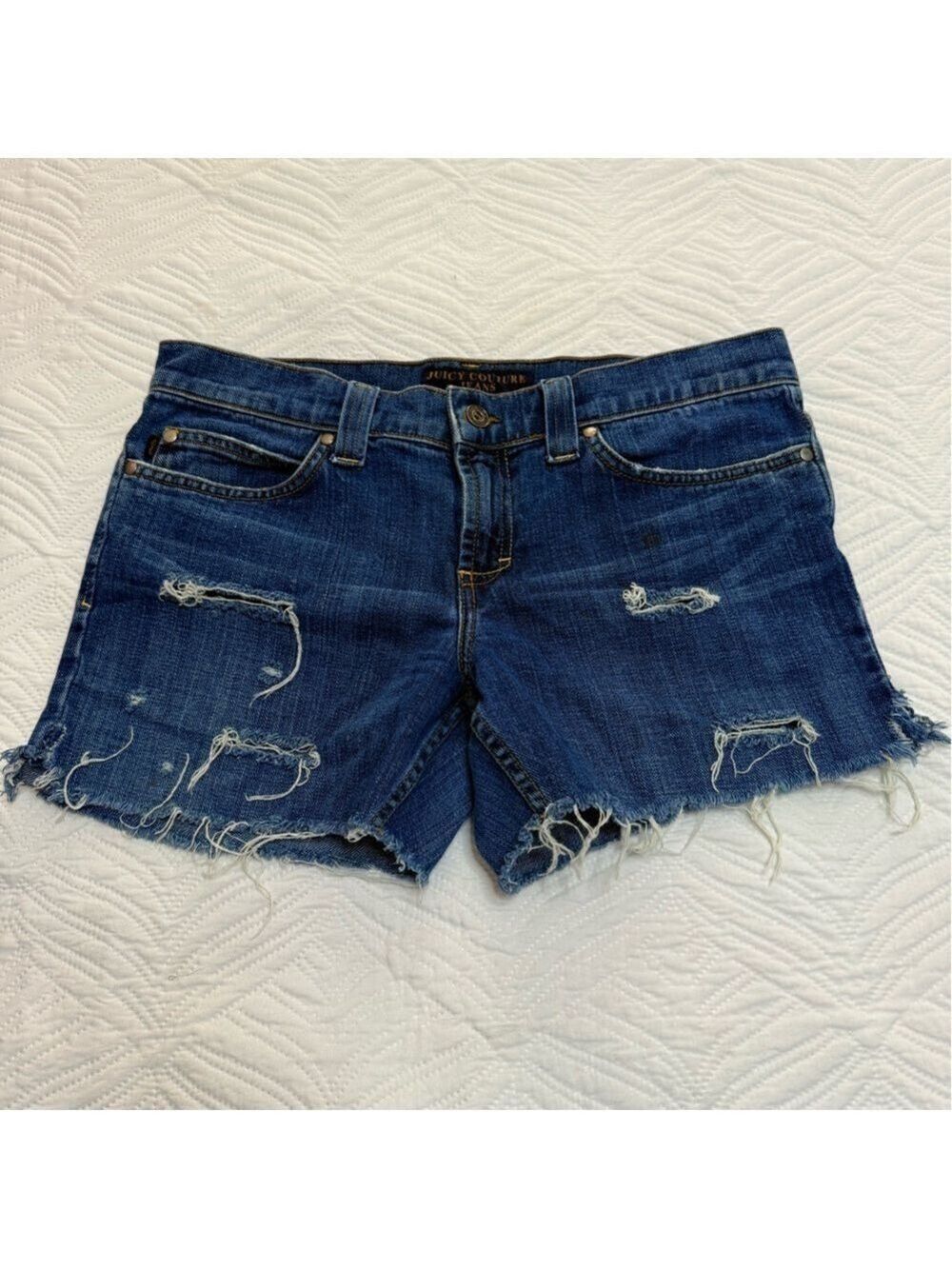 Juicy Couture Women’s Blue Distressed Denim Shorts. Size 30
